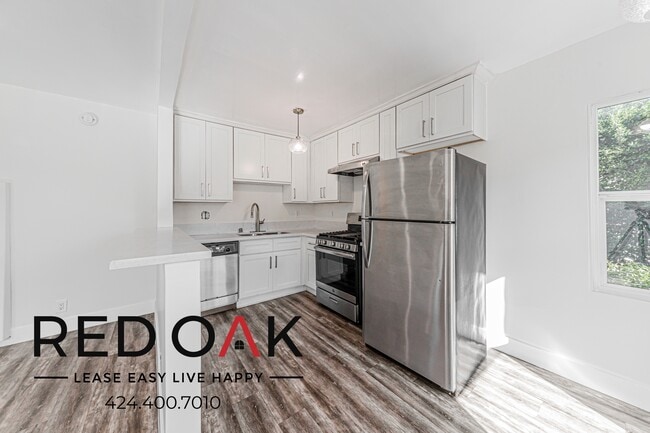 641 N Serrano Ave, Unit 1 in Los Angeles, CA - Building Photo - Building Photo