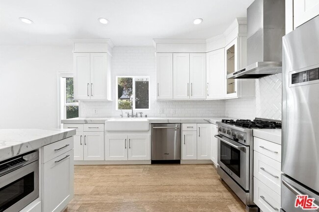 property at 7614 Willoughby Ave
