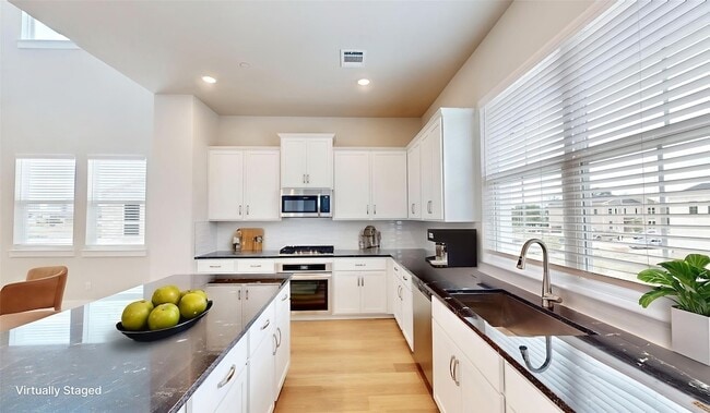 800 Concan Dr, Unit 1202 North Spaulding Ave.
