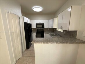 7301 NW 174th Terrace in Hialeah, FL - Building Photo - Building Photo