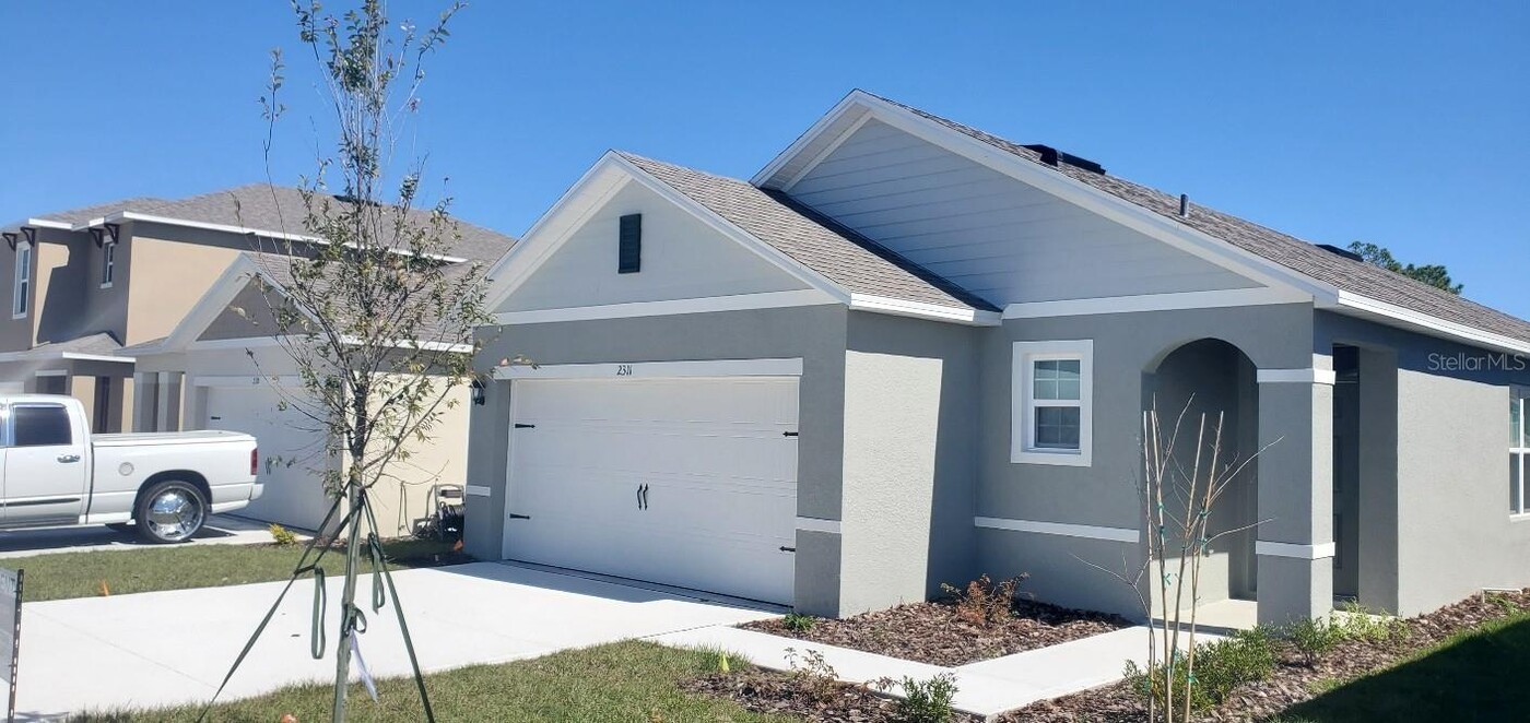 2311 Aquiline Nest St in Eagle Lake, FL - Building Photo