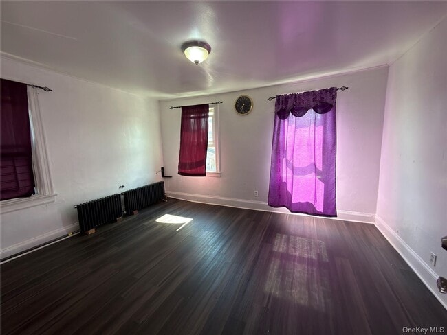 property at 107-11 129th St