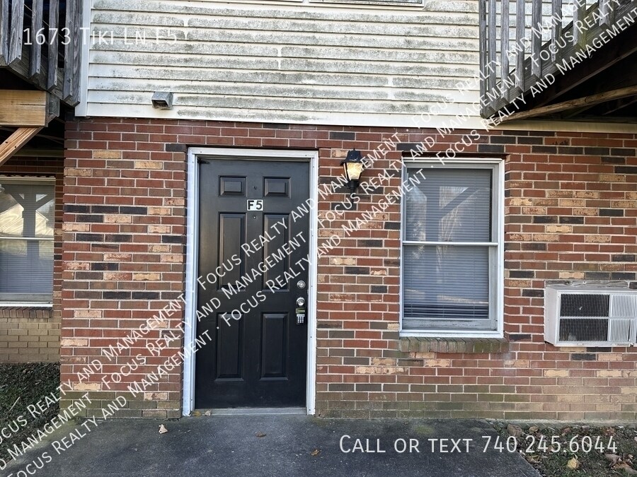 1673 Tiki Ln in Lancaster, OH - Building Photo