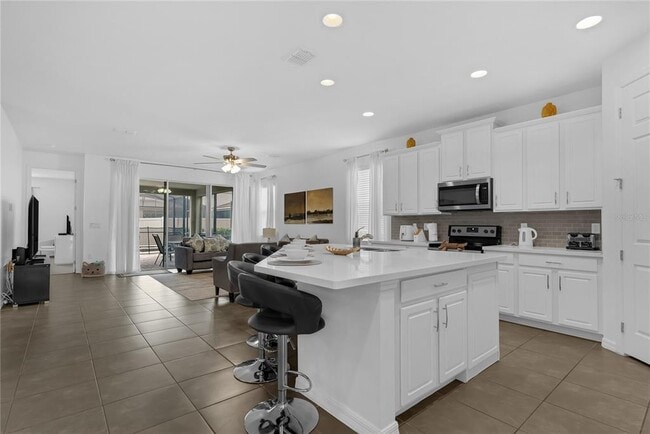 9018 Pelican Cv Trce in Kissimmee, FL - Building Photo - Building Photo