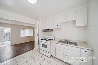 8633 Denver Ave in Los Angeles, CA - Building Photo - Building Photo