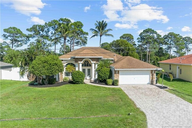 4213 SW Utterback St in Port St. Lucie, FL - Building Photo - Building Photo