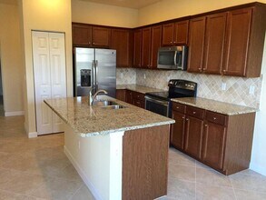 10217 Wellington Parc Dr in Wellington, FL - Building Photo - Building Photo