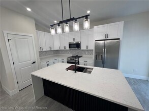 703 Aston Martin Dr in Sebring, FL - Building Photo - Building Photo
