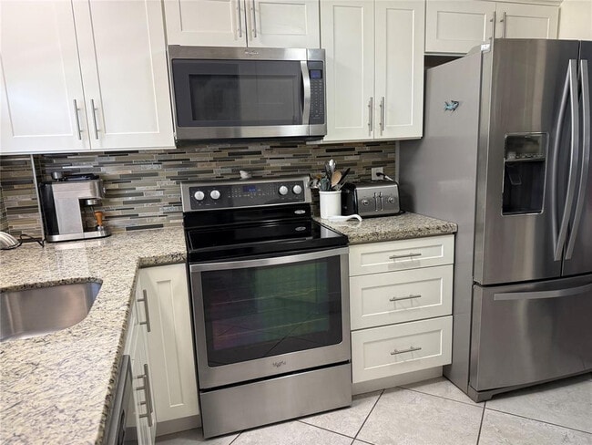 property at 1161 Hillsboro Mile