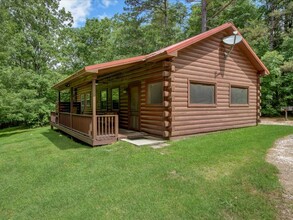 Remember When Cabins in Bismarck, AR - Building Photo - Building Photo