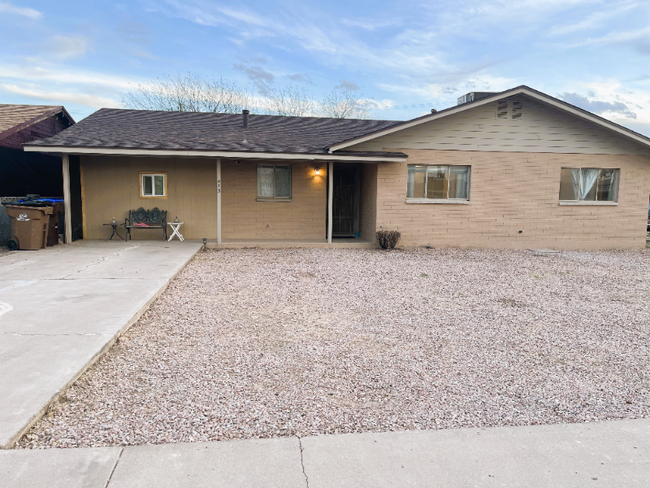 property at 413 E 3rd St