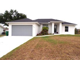 334 Millport St NW in Port Charlotte, FL - Building Photo