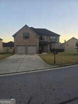 8722 Puett Dr in Douglasville, GA - Building Photo