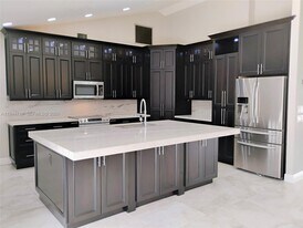 9654 Sun Pointe Dr in Boynton Beach, FL - Building Photo