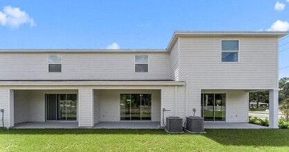 Enclave at Tara Greens Townhomes in Newberry, FL - Foto de edificio - Building Photo