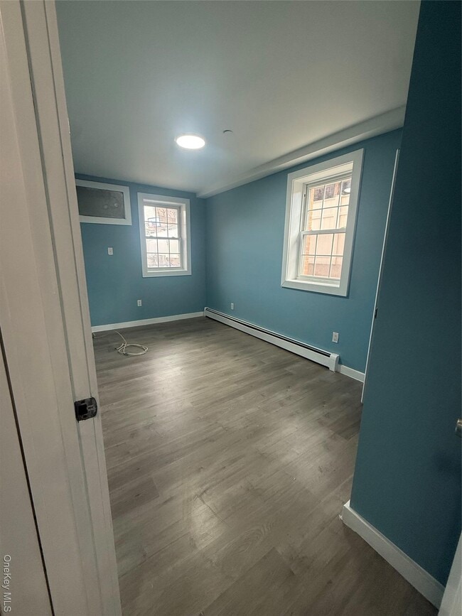 property at 188-27 Woodhull Ave