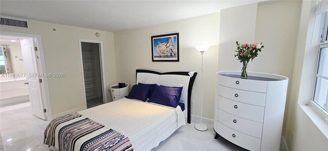 property at 6917 Collins Ave