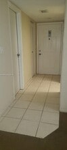 18101 NW 68th Ave, Unit C206 in Hialeah, FL - Foto de edificio - Building Photo