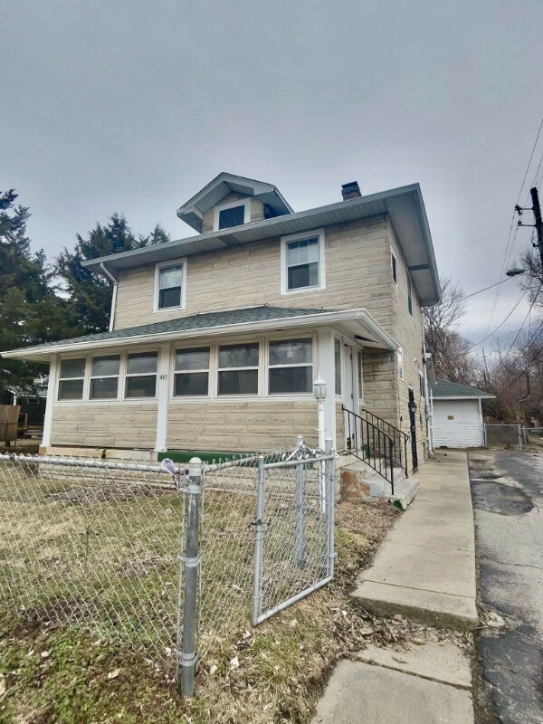 property at 445 W 25th St