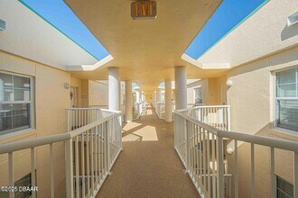 4650 Links Village Dr, Unit B701 in Ponce Inlet, FL - Building Photo - Building Photo