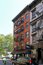 207-211 Mulberry St in New York, NY - Building Photo - Building Photo