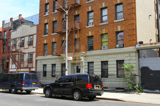 215-219 E 117th St in New York, NY - Building Photo - Building Photo