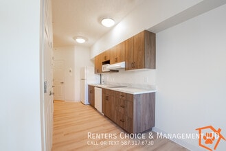 SENIOR LIVING IN THE EDWARDS ,First Floor Bachelor Suite in Lethbridge, AB - Building Photo - Building Photo
