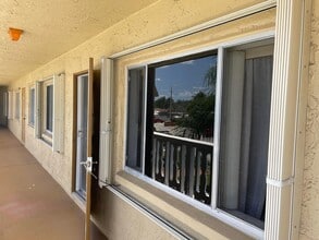 100 Village Green Cir E in Palm Springs, FL - Building Photo - Building Photo