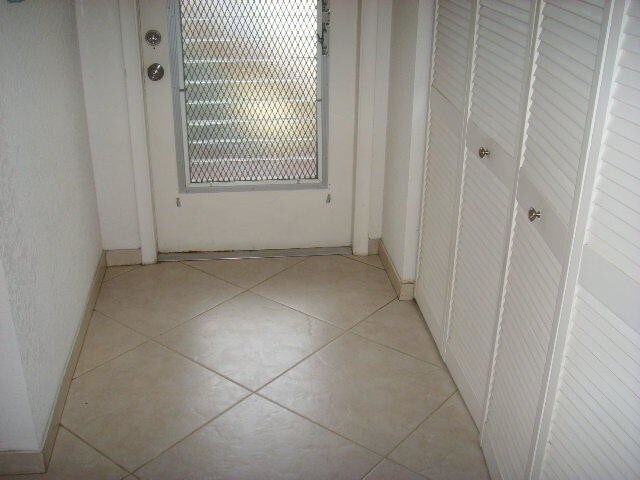 21 Abbey Ln-Unit -107 in Delray Beach, FL - Building Photo - Building Photo