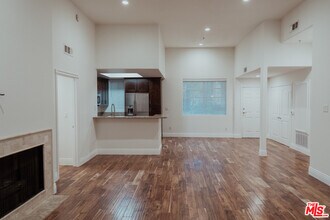 1225 Armacost Ave-Unit -106 in Los Angeles, CA - Building Photo - Building Photo