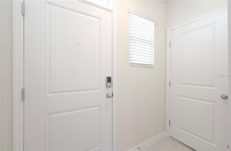 3302 Pine Lily Ave in Poinciana, FL - Building Photo - Building Photo