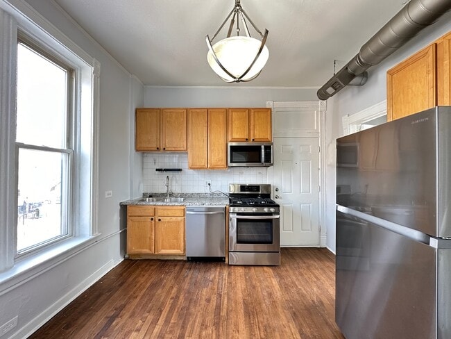 2609 W Thomas St, Unit K01J in Chicago, IL - Foto de edificio - Building Photo