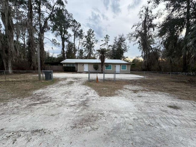 property at 211 NW Hwy 441