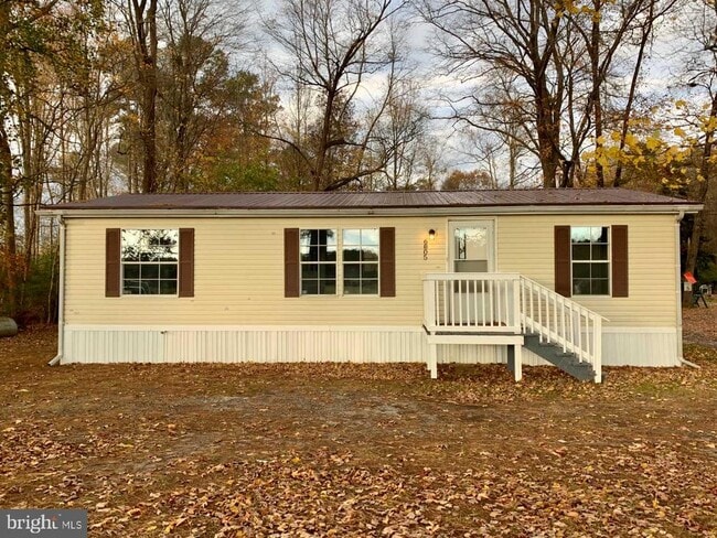 property at 6005 Delmar Rd