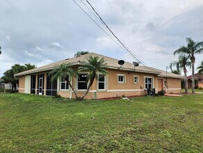 6031 NW Flair Ct in Port St. Lucie, FL - Building Photo - Building Photo