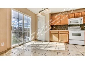7913 S Kalispell Way in Englewood, CO - Building Photo - Building Photo