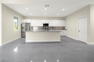 1043 Albert Ave in Lehigh Acres, FL - Building Photo - Building Photo