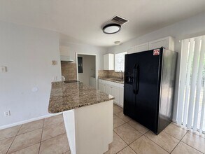 2433-2435 Lola Ave S in Lehigh Acres, FL - Building Photo - Building Photo