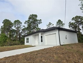 1956 Messmer Ave in Lehigh Acres, FL - Building Photo - Building Photo