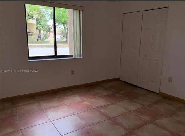 8977 SW 123rd Ct, Unit 107 in Miami, FL - Building Photo - Building Photo