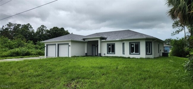 128 Bell Blvd in Lehigh Acres, FL - Building Photo - Building Photo