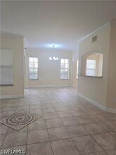 1256 Carpazi Ct in Naples, FL - Building Photo - Building Photo