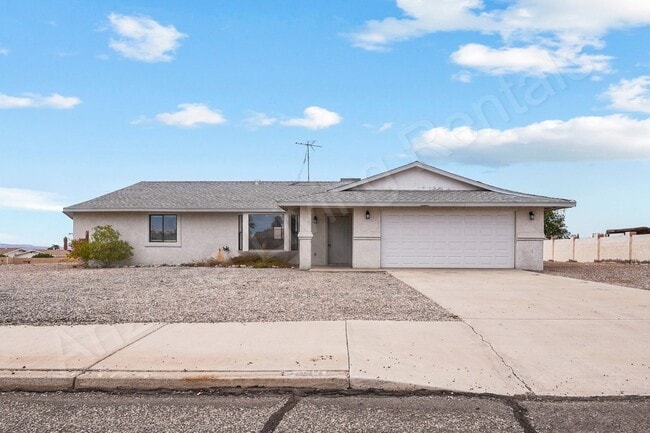 property at 2699 Smoketree Ave N