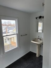 21 E 6th St in Oswego, NY - Building Photo - Building Photo