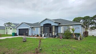 6448 NW Colgate St in Port St. Lucie, FL - Building Photo