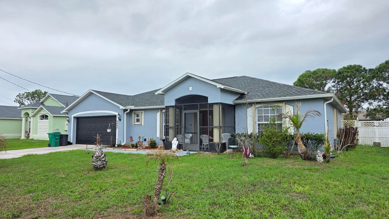 6448 NW Colgate St in Port St. Lucie, FL - Building Photo