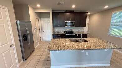 1061 Desert Candle Dr in Ocoee, FL - Building Photo - Building Photo