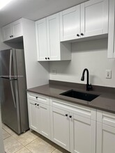 5055 NW 7th St, Unit 103 in Miami, FL - Building Photo - Building Photo