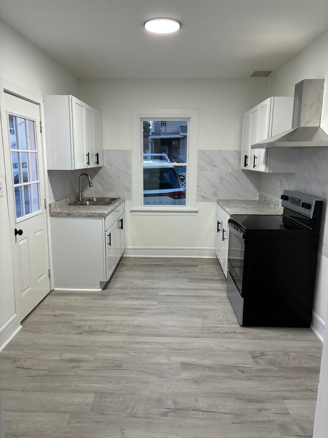 property at 1121 Monument St