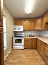 6001 NW 61st Ave in Tamarac, FL - Building Photo - Building Photo